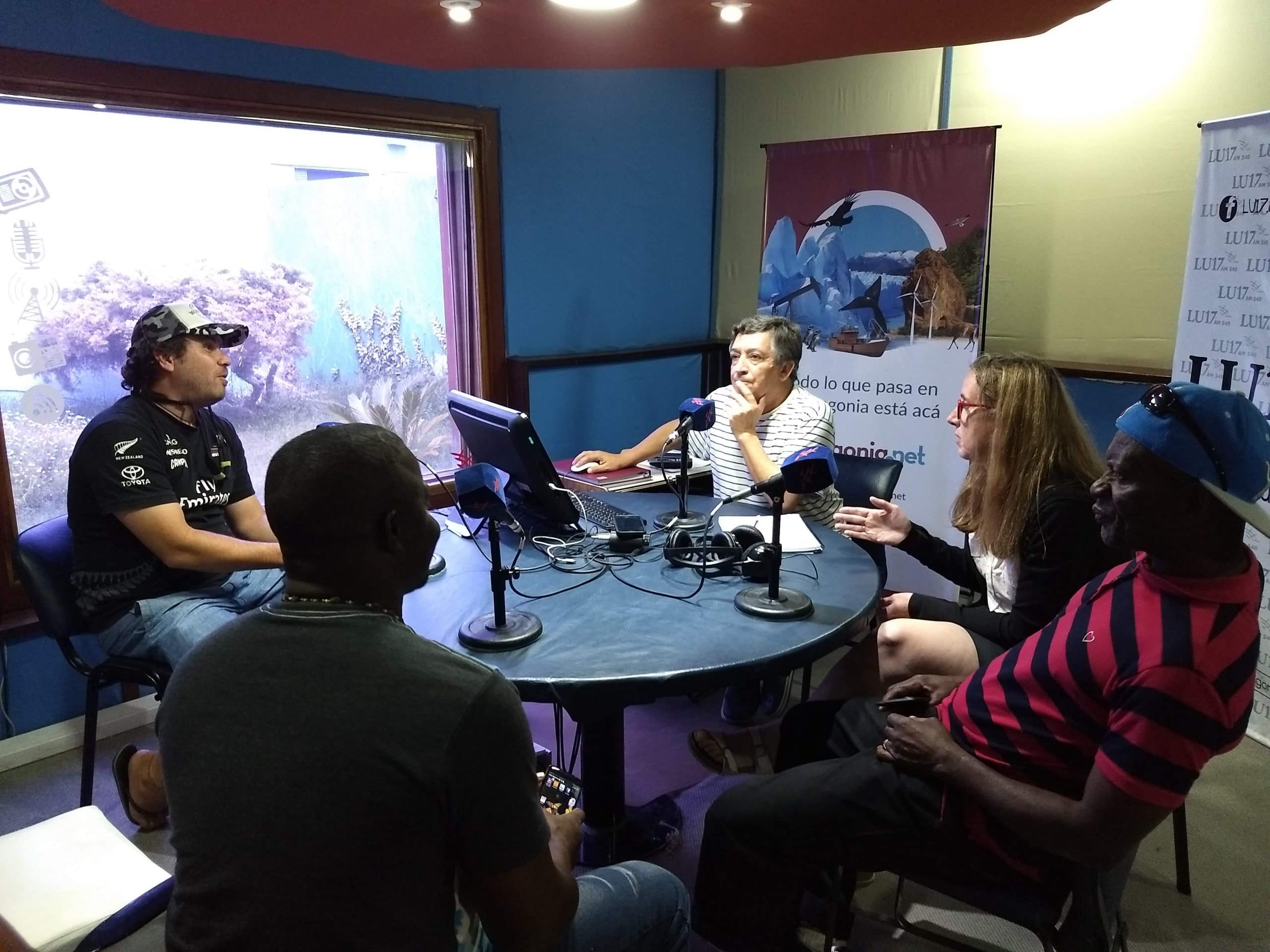 Lennox, Kirk and Carolina give a radio interview on a local station