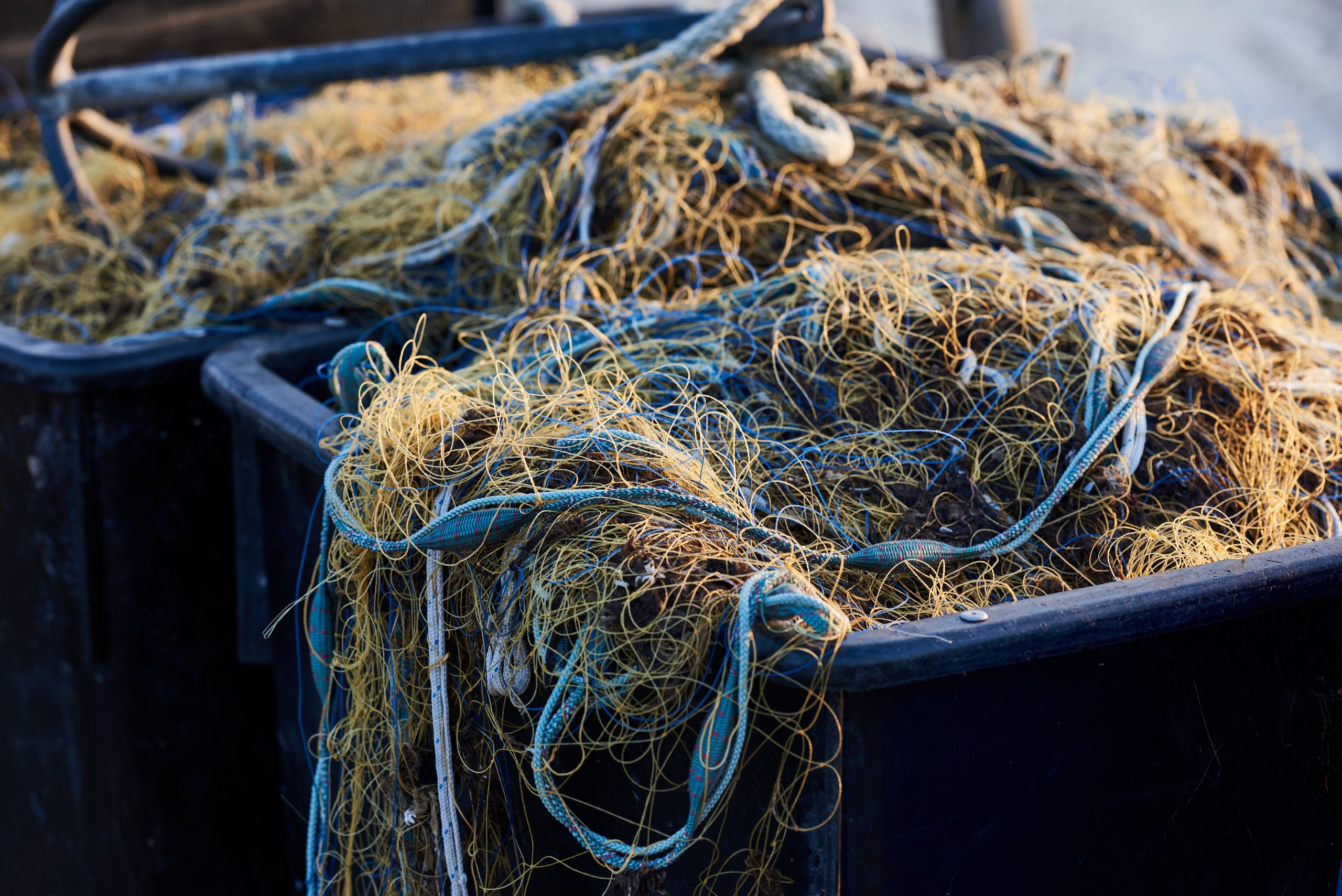 Fishing nets piled up at harbours